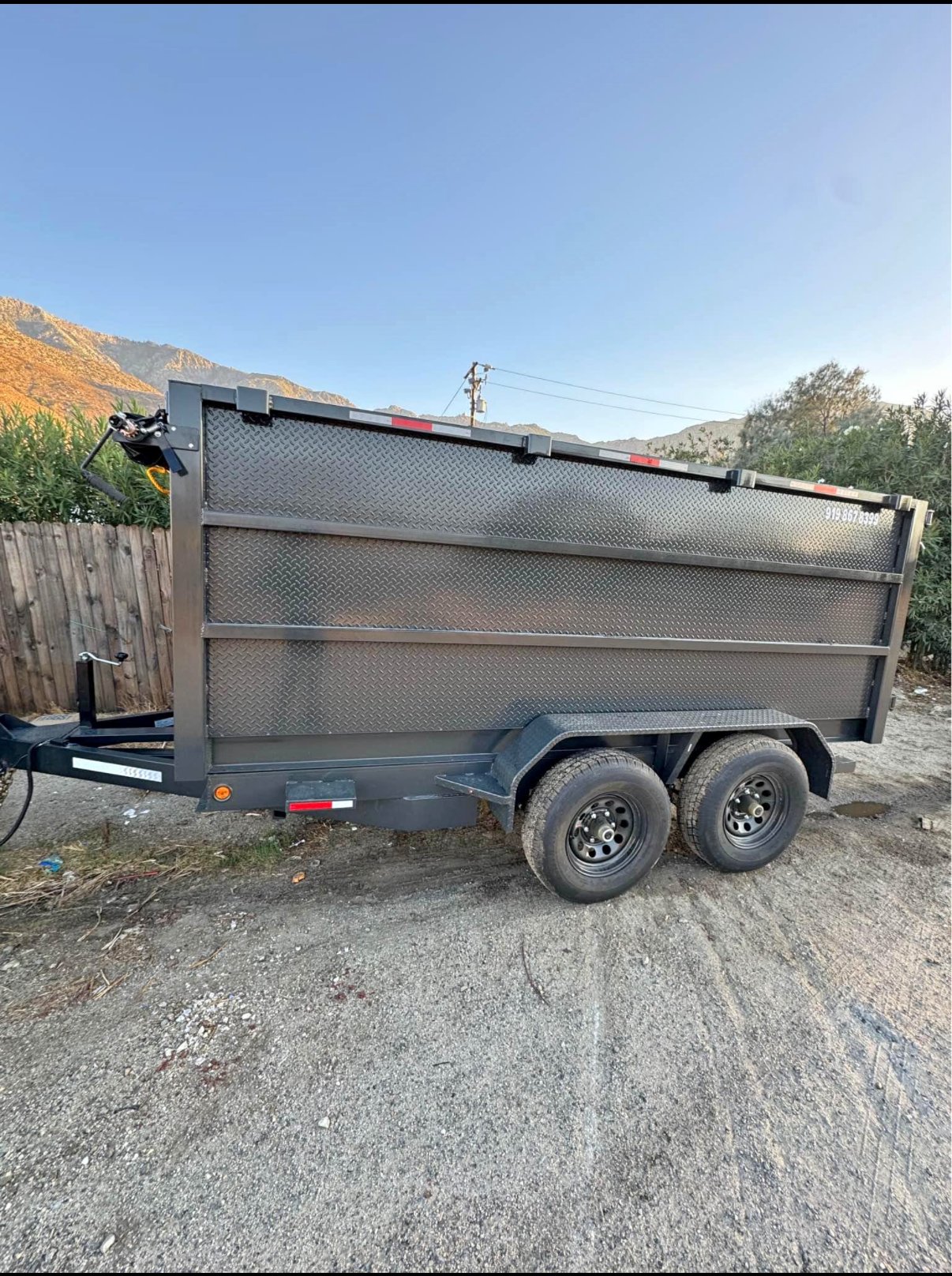 Dump trailer used for large-load removal
